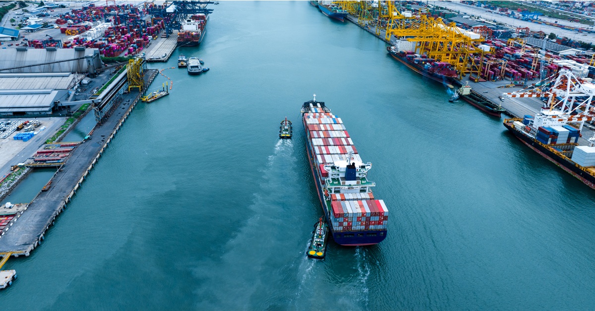 Shipyard cargo containers being transported