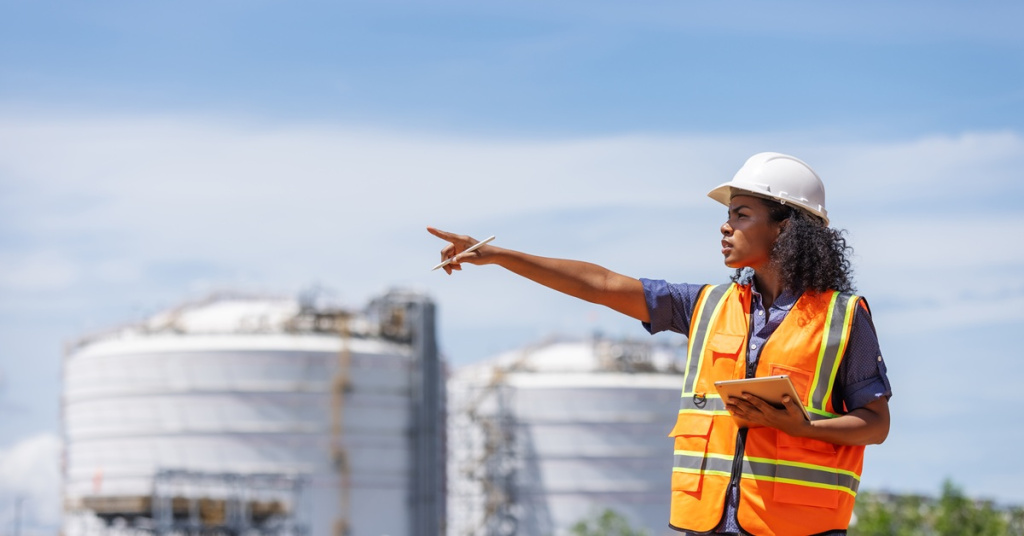Woman inspecting industrial site