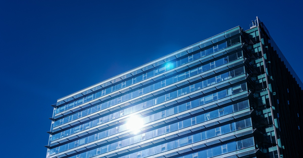 sunlight reflecting off glass building