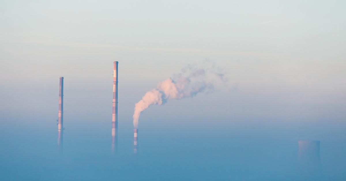 emissions over city landscape with smoke