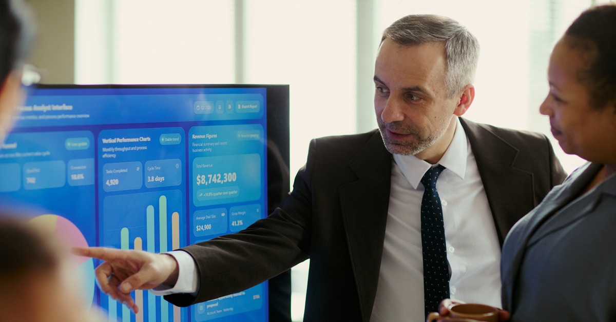 man presenting data during meeting
