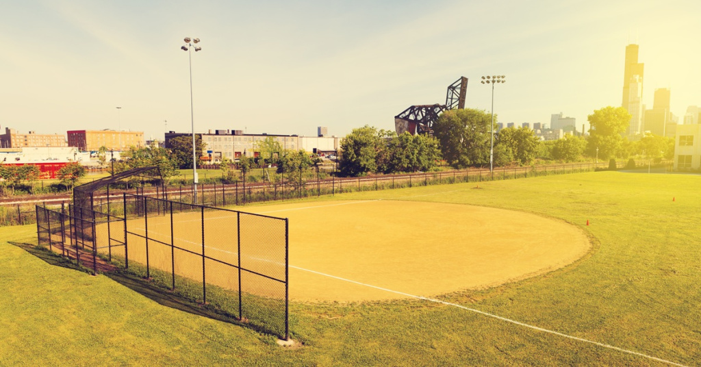 baseball field near buildings in the daytime