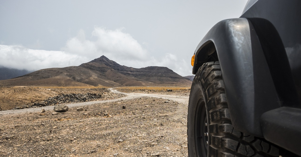large off road wheel in rocky terrain
